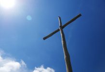 Why do we make the sigh of the cross?